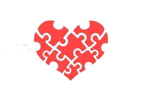 puzzle pieces in form of red heart. The heart of the puzzle vector