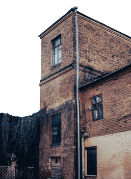 Side view of old red bricks building concept photo. Old city building photography png