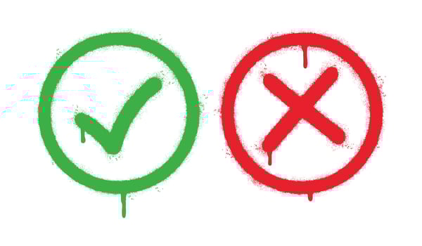Spray Painted Graffiti Green tick check mark and cross mark icon Sprayed isolated with a white background. graffiti symbols YES and NO with over spray in black over white. vector