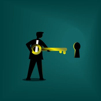 Businessman holding a key of success vector