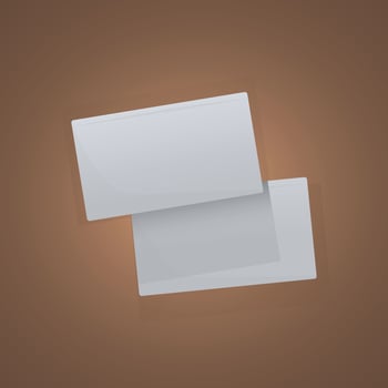 Plastic or paper white business card isolated on brown background. Vector blank sticker, sheet, label, banner with rounded corners template
