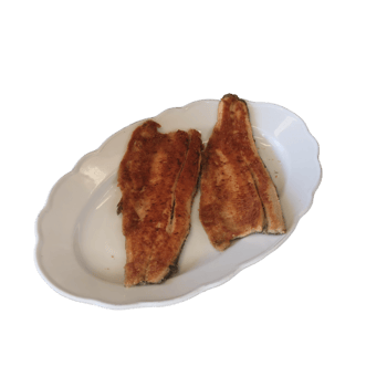 Breaded and fried sea bass fillet on a serving plate- png