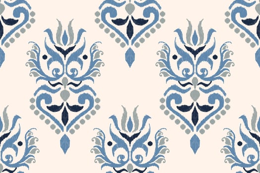 Ikat floral paisley embroidery on white background.Ikat ethnic oriental seamless pattern traditional.Aztec style abstract vector illustration.design for texture,fabric,clothing,wrapping,decoration.