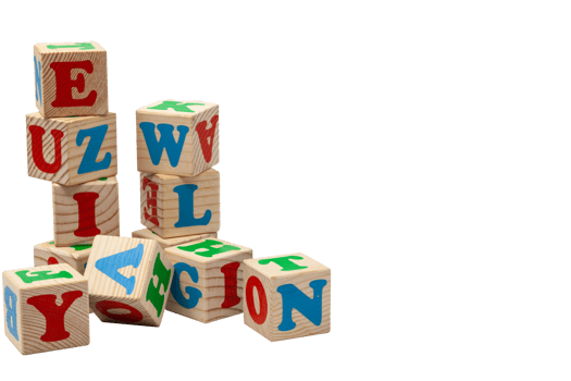 Wooden children's play cubes with blue, red and green letters in the shape of towers stand one on top of the other and lay side by side. Isolate. png