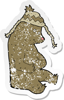 retro distressed sticker of a cartoon bear in winter hat png