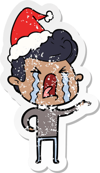 distressed sticker cartoon of a crying man wearing santa hat png