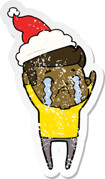 distressed sticker cartoon of a man crying wearing santa hat png