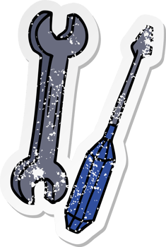 hand drawn distressed sticker cartoon doodle of a spanner and a screwdriver png