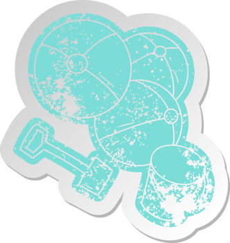 distressed old cartoon sticker beach balls with a bucket and spade png