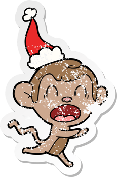 shouting hand drawn distressed sticker cartoon of a monkey wearing santa hat png