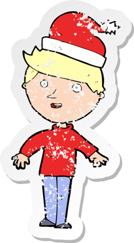 retro distressed sticker of a cartoon boy in santa hat png