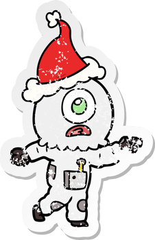 hand drawn distressed sticker cartoon of a cyclops alien spaceman pointing wearing santa hat png