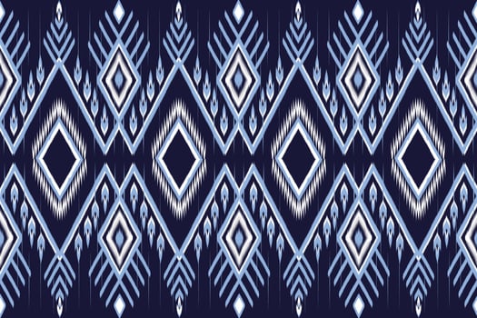 Ethnic Blue and White Ikat Pattern on Dark Blue background.  Seamless Pattern Vector design for fabric, tile, carpet, embroidery, wallpaper and background
