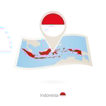 Folded paper map of Indonesia with flag pin of Indonesia. vector