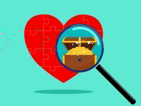 magnifying glass to find treasure in the heart vector