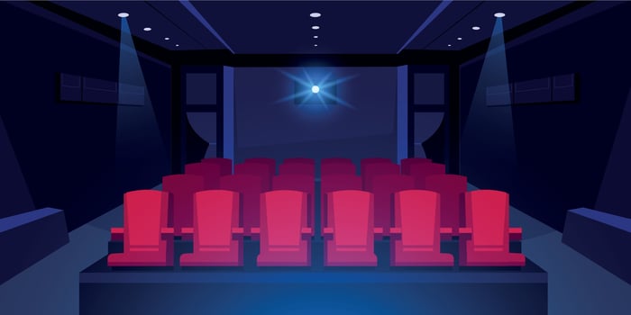 Cartoon cinema auditorium. Movie theater dark room with red seats and cinema projector glowing, scene background with concert hall interior. Vector illustration