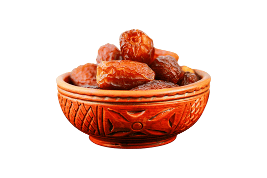 Dates fruit in a clay bowl isolated on a transparent background png