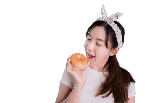 Smiling woman holding a sweet donut while a female happily eats a Sugar coated donuts. On Isolated White background. png