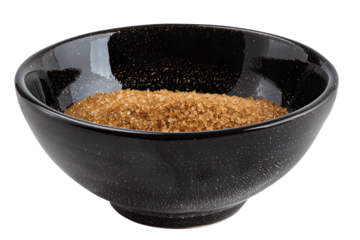AI generated Organic brown sugar in black bowl on transparent background - stock png. png