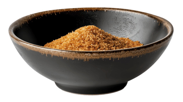 AI generated Organic brown sugar in black bowl on transparent background - stock png. png