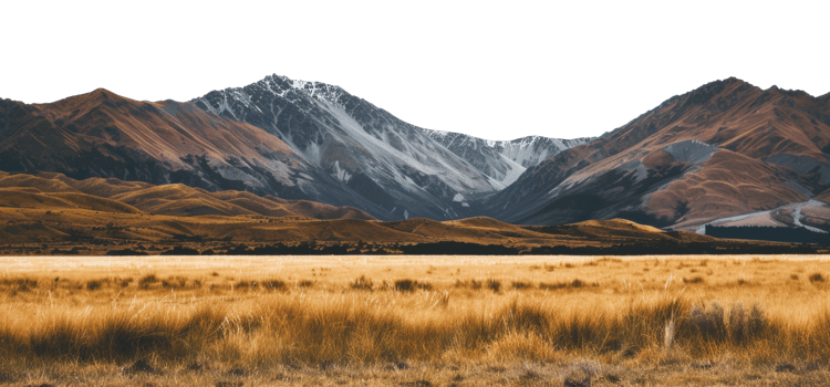 AI generated Snow-capped mountains towering over golden meadows and trees on transparent background - stock png. png