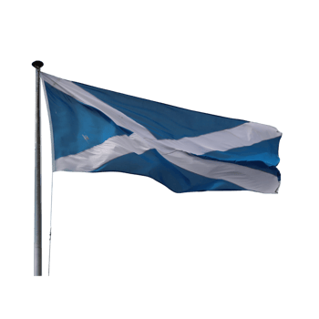 The national flag of scotland, the saltire, waving proudly on a cloudy day png