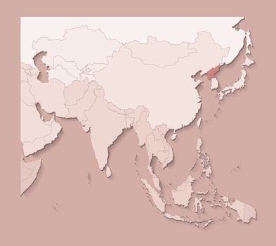 illustration with asian areas with borders of states and marked country North Korea. Political map in brown colors with regions. Beige background vector