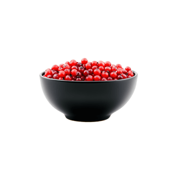 Lingonberries small and round with a bright red color piled in a small decorative bowl png