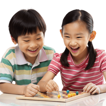 Happy children playing board game together with joy png