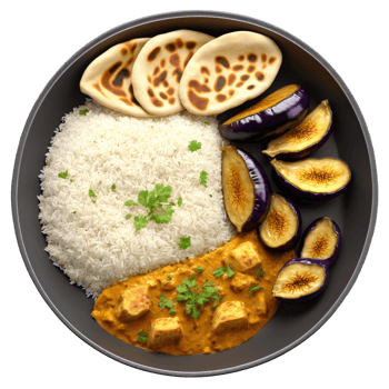Aromatic curry bowl with tender goat basmati rice roasted eggplant and naan bread served in png