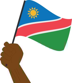 Hand holding and raising the national flag of Namibia vector