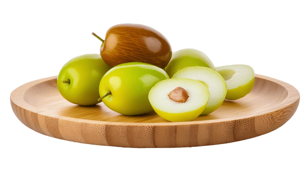 whole and cut fresh green jujubes on a wooden plate png