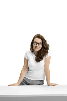 young and friendly teacher at her desk interacting the class png