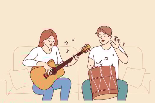 Cheerful friends playing musical instruments, sitting on sofa and using drum with guitar vector