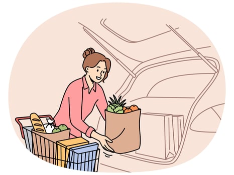 Smiling woman unload groceries into car vector