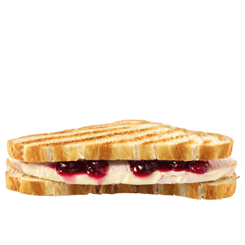 Turkey and brie panini sandwich sliced turkey brie cheese cranberry sauce sourdough bread pressed Culinary png