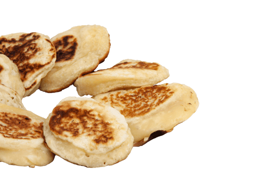 Delicious country breakfast, fried pancakes in a plate with a fork on no background. Horizontal. For text. png
