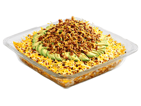 Pulled Chicken Nachos with cheese beans and avocado served on a transparent glass dish hearty png