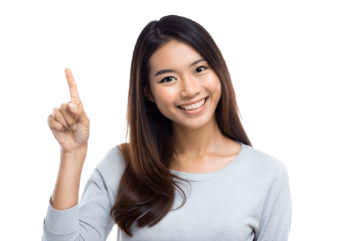 A cheerful woman in a light grey shirt points upwards with a smile on her face against a transparent background png