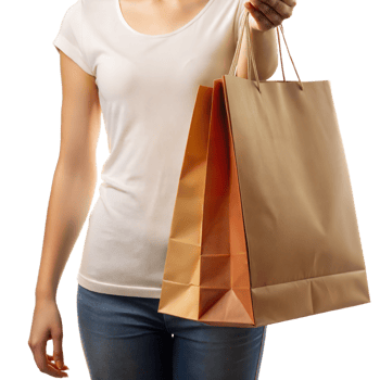 A woman in a white shirt and jeans holding brown shopping bags png