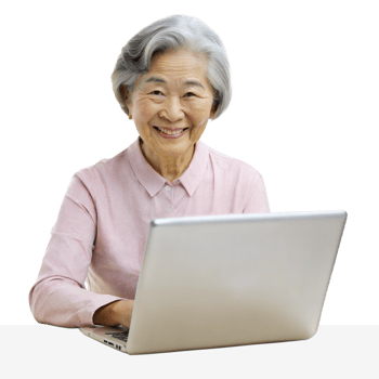 A woman is sitting at a table with a laptop in front of her png