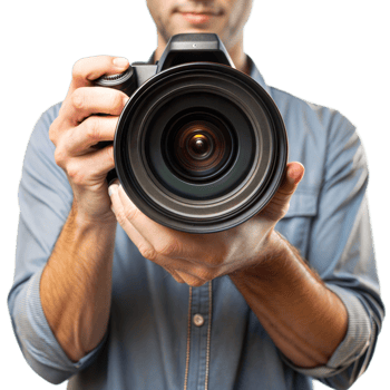 A man is holding a camera with a lens in his hand png