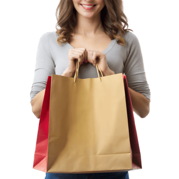 A woman is holding a shopping bag with a smile on her face png