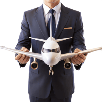 A man in a suit holding a model airplane png