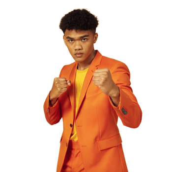 Confident young man in orange suit with fists raised on transparent background png