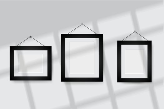 picture frame hanging on beige wall. Empty poster mockup for art display in sunlight. vector