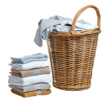 A wicker laundry basket overflowing with clean clothes, next to a stack of freshly laundered and folded garments isolated on a transparent background png