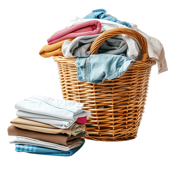 A wicker laundry basket overflowing with clean clothes, next to a stack of freshly laundered and folded garments isolated on a transparent background png
