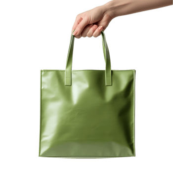 Woman's hand holding a green canvas bag. on transparent background png