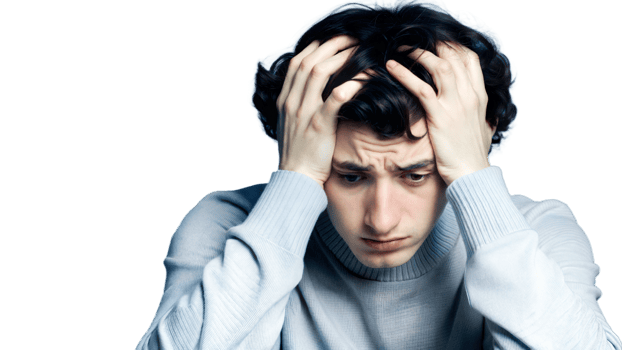 Person experiencing stress and anxiety, feeling overwhelmed with head in hands. png
